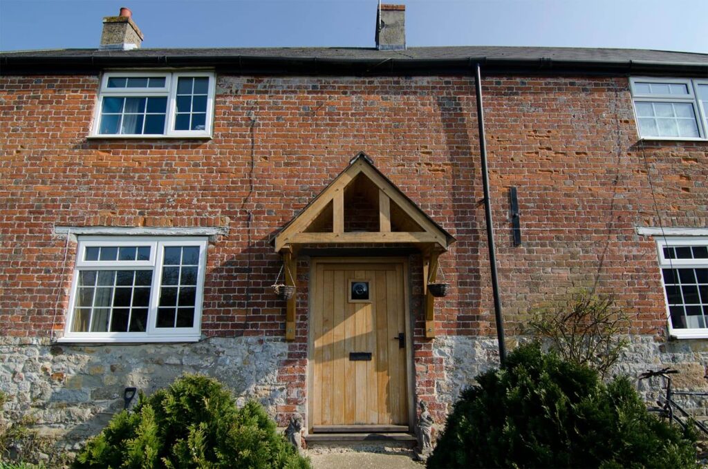 Solid oak door and porch for period farmhouse in Whitchurch Canonicorum, Dorset